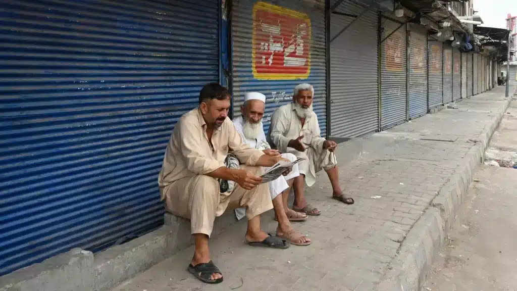 Traders protest as peace committee member shop set on fire in Bannu