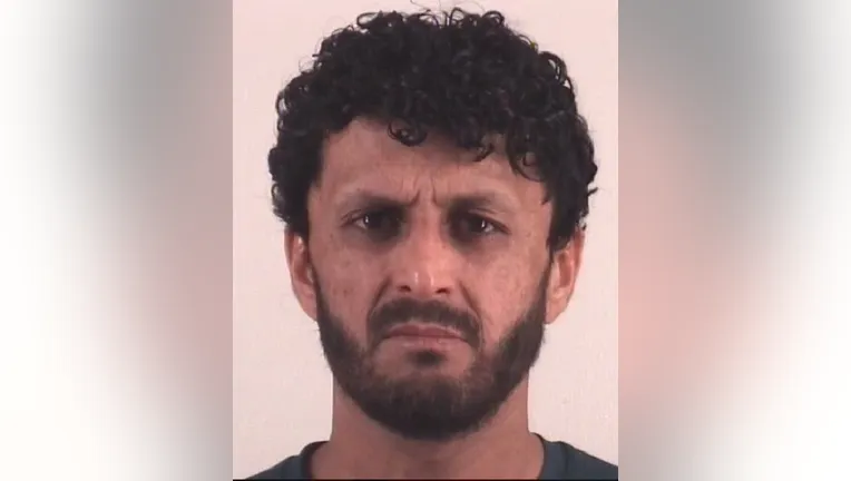 An Afghan national was arrested and charged with making terroristic threats Tuesday after posting a video on TikTok indicating he was building a bomb to target the Fort Worth area.