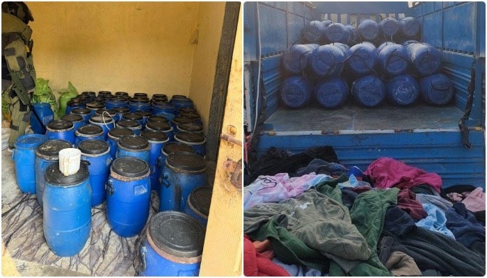 Police and security officials at the crime scene in Baldia Town's Raees Goth after arresting a suicide bomber.