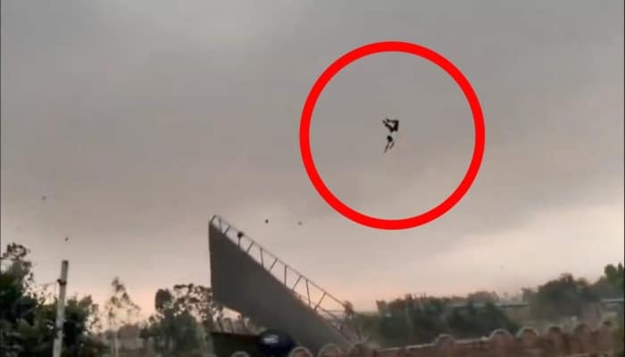 Indian Man Swept into Air by Powerful Storm
