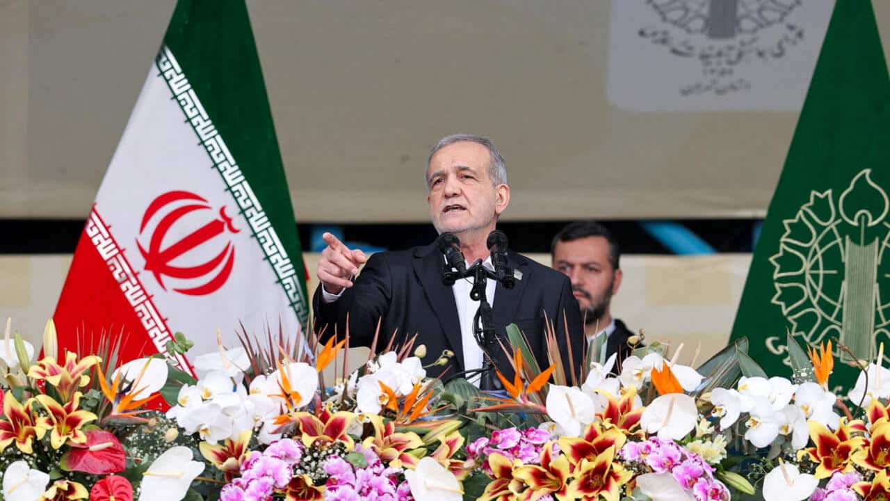 Iranian President says national flag will never be lowered despite challenges