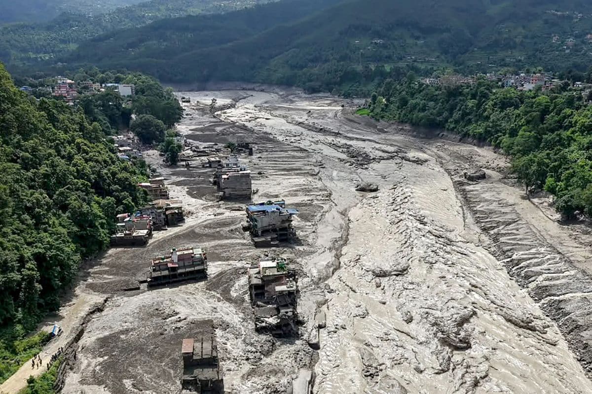 Floods and landslides kill more than 50 in India and 14 in Nepal